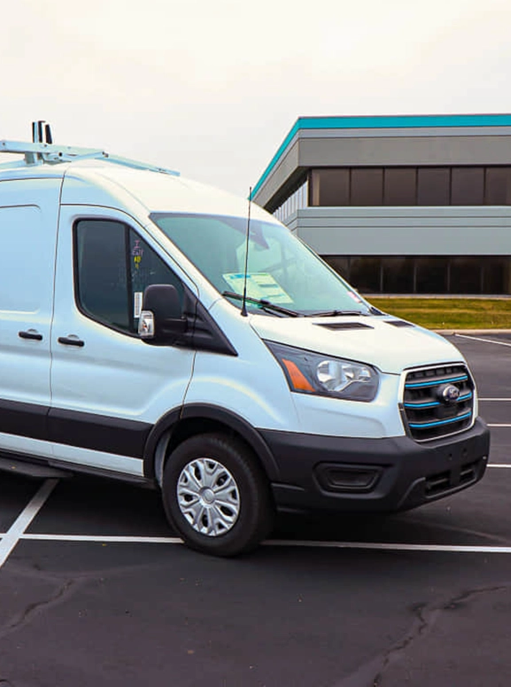 front view of an electric transit bus in white in Elkhart